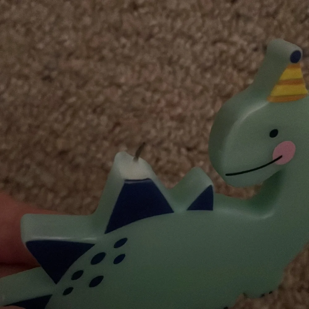 Dinosaur candle